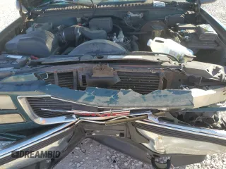 1997 GMC Suburban z VIN 3GKFK16R7VG514905, wystawiony jako Copart lot #77410934 z przebiegiem 193 116 mil mil oraz Szkoda całkowita • Salvage title. Historia ofert i sprzedaży dostępna na DreamBid. Obrazek 13.