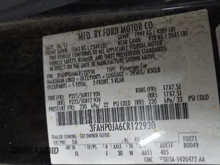 2012 Ford Fusion SEL z VIN 3FAHP0JA6CR122930, wystawiony jako IAAI lot #42789619 z przebiegiem 191 000 mil mil oraz . Historia ofert i sprzedaży dostępna na DreamBid. Obrazek 9.