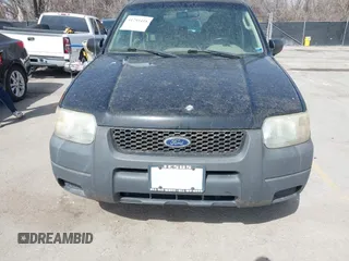 2003 Ford Escape XLS Popular with VIN 1FMYU02153KB46301, listed as a IAAI auction lot 41793418 with 188,184 mi miles and . Bid and sale history available at DreamBid. Image 6.