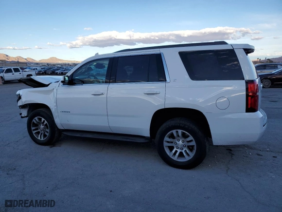 2019 Chevrolet Tahoe LT with VIN 1GNSKBKC0KR123602, listed as a Copart auction lot 48408875 with 77,652 mi miles and Salvage Title. Bid and sale history available at carsss.com. Image 2.