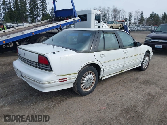1996 Oldsmobile Cutlass Supreme S z VIN 1G3WH52M6TF328427, wystawiony jako IAAI lot #41718618 z przebiegiem 104 914 mil mil oraz . Historia ofert i sprzedaży dostępna na DreamBid. Obrazek 4.