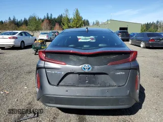2021 Toyota Prius LE with VIN JTDKAMFP7M3185847, listed as a Copart auction lot 52897465 with 58,996 mi miles and Salvage Title. Bid and sale history available at DreamBid. Image 6.