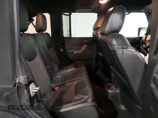 2018 Jeep Wrangler JK Unlimited Sport S with VIN 1C4HJWDG2JL840369, listed as a Copart auction lot 85749804 with 63,658 mi miles and Clean Title. Bid and sale history available at carsss.com. Image 11.