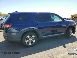 2025 Honda Pilot EX-L with VIN 5FNYG1H47SB039006, listed as a Copart auction lot 52560115 with 10,870 mi miles and Salvage Title. Bid and sale history available at carsss.com. Image 3.