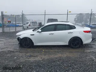 2018 Kia Optima S with VIN 5XXGT4L36JG209780, listed as a IAAI auction lot 40008792 with 97,575 mi miles. Bid and sale history available at carsss.com. Image 15.