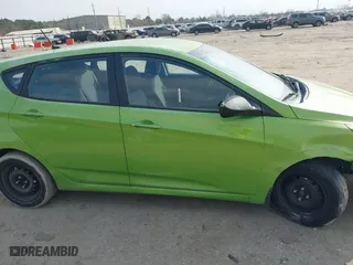 2014 Hyundai Accent GS with VIN KMHCT5AE8EU164507, listed as a IAAI auction lot 41540324 with 216,144 mi miles. Bid and sale history available at carsss.com. Image 13.