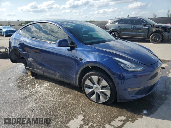 2022 Tesla Model Y Long Range with VIN 7SAYGAEE2NF390507, listed as a Copart auction lot 50986965 with 48,027 mi miles and Non Repairable. Bid and sale history available at DreamBid. Image 4.