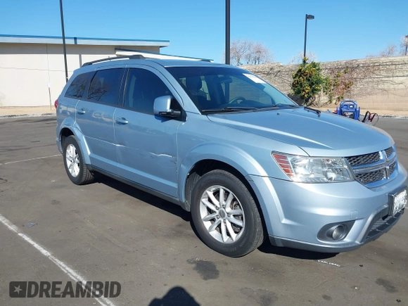 2013 Dodge Journey SXT with VIN 3C4PDCBG5DT674863, listed as a IAAI auction lot 41670225 with 207,524 mi miles. Bid and sale history available at carsss.com. Image 6.