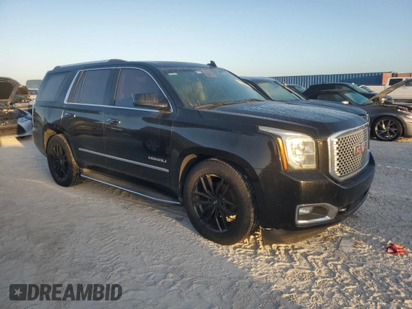 2015 GMC Yukon Denali with VIN 1GKS2CKJ5FR529091, listed as a Copart auction lot 77325934 with 0 mi miles and Clean Title. Bid and sale history available at carsss.com. Image 4.