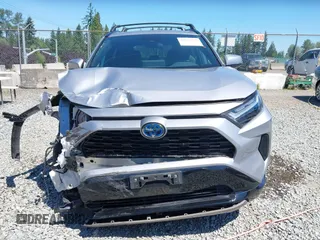 2022 Toyota RAV4 Hybrid SE with VIN 4T3T6RFV7NU100943, listed as a IAAI auction lot 42621376 with 22,543 mi miles and . Bid and sale history available at DreamBid. Image 13.