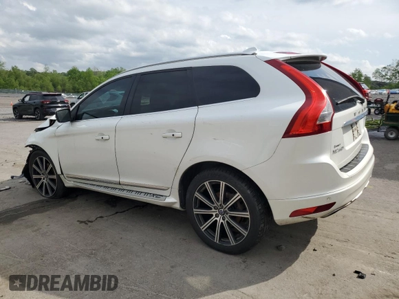 2015 Volvo XC60 T6 Platinum с VIN YV4902RM5F2701166, выставлен на аукционе Copart как лот 57146735 с пробегом 156 235 миль миль и Списание • Salvage title. История ставок и продаж доступна на DreamBid. Изображение 2.