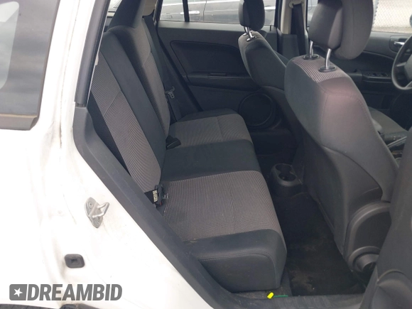 2011 Dodge Caliber Mainstreet with VIN 1B3CB3HA0BD157191, listed as a IAAI auction lot 42128580 with 185,474 mi miles. Bid and sale history available at carsss.com. Image 8.