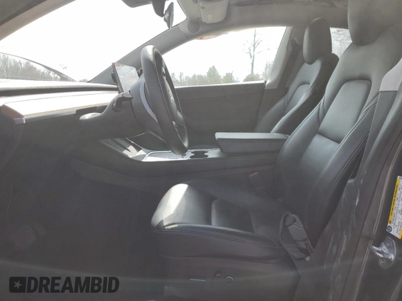 2022 Tesla Model Y Long Range with VIN 7SAYGDEE5NF366493, listed as a Copart auction lot 49874975 with 66,925 mi miles and Salvage Title. Bid and sale history available at DreamBid. Image 7.