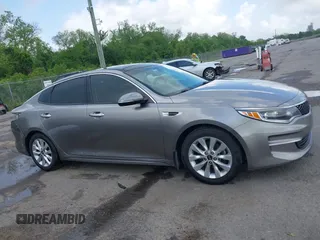 2018 Kia Optima EX with VIN 5XXGU4L36JG253629, listed as a IAAI auction lot 42079946 with 136,575 mi miles and . Bid and sale history available at carsss.com. Image 14.