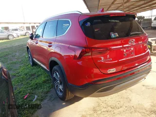 2023 Hyundai Santa Fe SEL z VIN 5NMS2DAJ6PH485739, wystawiony jako IAAI lot #41922331 z przebiegiem 74 224 mil mil oraz . Historia ofert i sprzedaży dostępna na DreamBid. Obrazek 3.