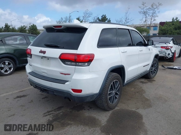 2018 Jeep Grand Cherokee Trailhawk with VIN 1C4RJFLT2JC137793, listed as a IAAI auction lot 41697299 with 149,100 mi miles and . Bid and sale history available at DreamBid. Image 4.