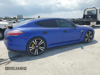 2013 Porsche Panamera z VIN WP0AA2A70DL010203, wystawiony jako Copart lot #59670655 z przebiegiem 73 032 mil mil oraz Czysty tytuł • Clean title. Historia ofert i sprzedaży dostępna na DreamBid. Obrazek 3.