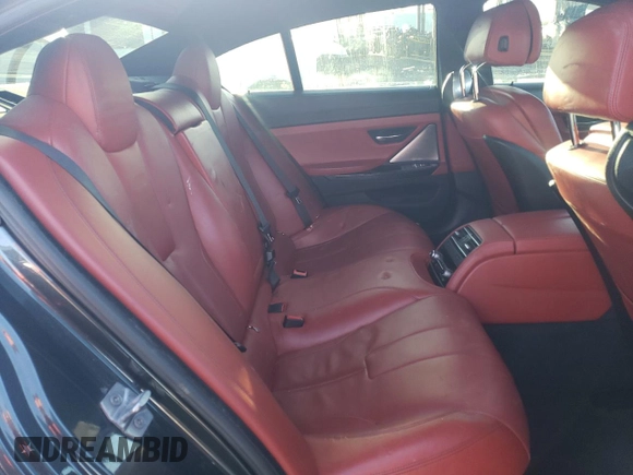2015 BMW M6 z VIN WBS6C9C5XFD467854, wystawiony jako Copart lot #86177724 z przebiegiem 55 789 mil mil oraz Szkoda całkowita • Salvage title. Historia ofert i sprzedaży dostępna na DreamBid. Obrazek 6.