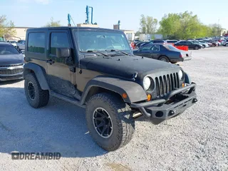 2008 Jeep Wrangler X with VIN 1J4FA24118L646979, listed as a IAAI auction lot 41981709 with 142,081 mi miles and . Bid and sale history available at carsss.com. Image 1.