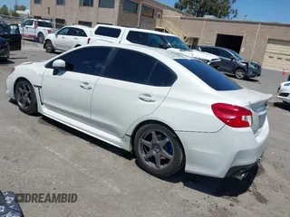 2021 Subaru WRX z VIN JF1VA1A68M9801794, wystawiony jako IAAI lot #42421444 z przebiegiem 100 920 mil mil oraz . Historia ofert i sprzedaży dostępna na DreamBid. Obrazek 3.