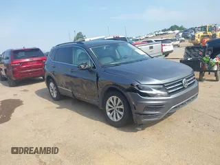 2018 Volkswagen Tiguan SEL with VIN 3VV3B7AX1JM045203, listed as a IAAI auction lot 42572229 with 104,873 mi miles and . Bid and sale history available at DreamBid. Image 1.