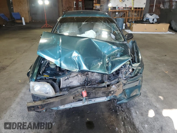 1996 Toyota Tercel DX z VIN JT2BC52L7T7044201, wystawiony jako Copart lot #77190074 z przebiegiem Nie podano mil oraz Szkoda całkowita • Salvage title. Historia ofert i sprzedaży dostępna na DreamBid. Obrazek 5.