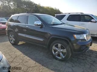2012 Jeep Grand Cherokee Overland with VIN 1C4RJFCG4CC292383, listed as a Copart auction lot 51168385 with 132,697 mi miles and Salvage Title. Bid and sale history available at carsss.com. Image 4.