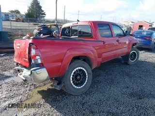 2015 Toyota Tacoma with VIN 3TMMU4FN1FM077045, listed as a IAAI auction lot 41670552 with 118,983 mi miles and . Bid and sale history available at DreamBid. Image 4.