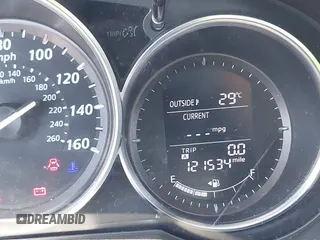 2014 Mazda CX-5 Sport with VIN JM3KE2BE7E0371203, listed as a IAAI auction lot 42243756 with 121,534 mi miles and . Bid and sale history available at DreamBid. Image 16.