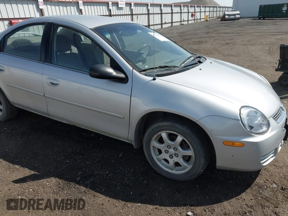 2005 Dodge Neon SXT with VIN 1B3ES56C75D273890, listed as a IAAI auction lot 42149159 with 212,741 mi miles. Bid and sale history available at carsss.com. Image 1.
