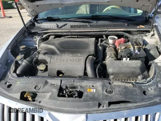 2010 Lincoln MKS EcoBoost with VIN 1LNHL9FT6AG612143, listed as a Copart auction lot 49469855 with 154,310 mi miles and Salvage Title. Bid and sale history available at DreamBid. Image 12.
