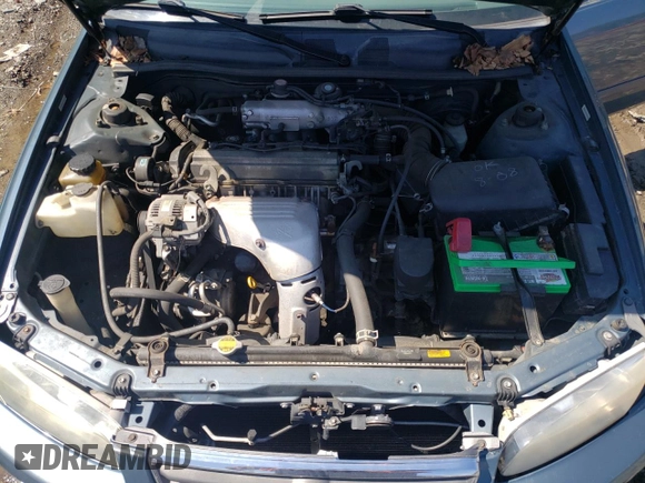 2001 Toyota Camry CE z VIN 4T1BG22KX1U788449, wystawiony jako Copart lot #48906494 z przebiegiem 105 062 mil mil oraz Szkoda całkowita • Salvage title. Historia ofert i sprzedaży dostępna na DreamBid. Obrazek 11.
