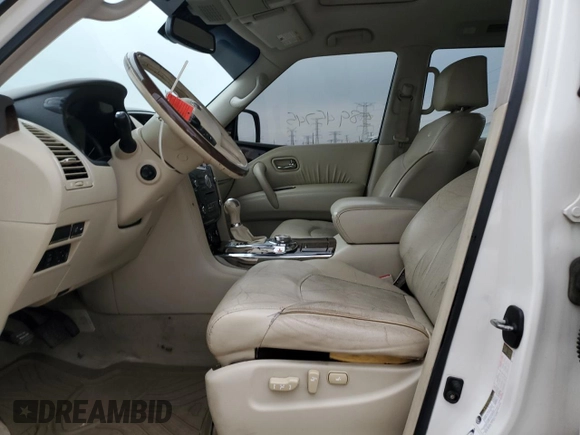 2012 Infiniti QX56 7-passenger с VIN JN8AZ2NE6C9017870, выставлен на аукционе Copart как лот 58945745 с пробегом 130 847 миль миль и Списание • Salvage title. История ставок и продаж доступна на DreamBid. Изображение 7.