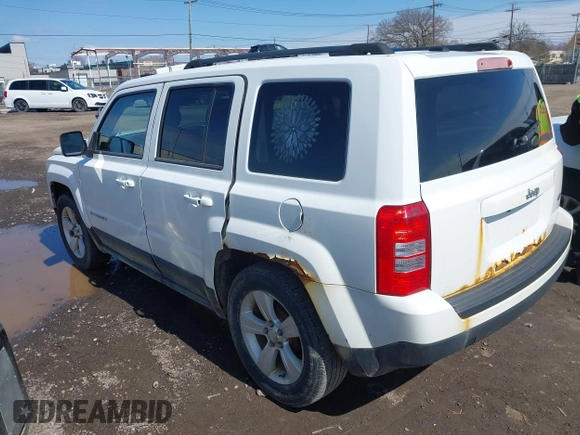 2014 Jeep Patriot Latitude with VIN 1C4NJPFA8ED550221, listed as a IAAI auction lot 41919419 with 185,386 mi miles and . Bid and sale history available at carsss.com. Image 3.