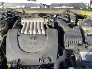 2003 Hyundai Sonata GLS with VIN KMHWF35H03A872584, listed as a IAAI auction lot 41538079 with 203,501 mi miles. Bid and sale history available at carsss.com. Image 10.