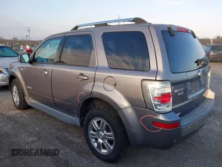 2008 Mercury Mariner Premier with VIN 4M2CU97128KJ38119, listed as a IAAI auction lot 41213121 with 76,699 mi miles and . Bid and sale history available at DreamBid. Image 3.