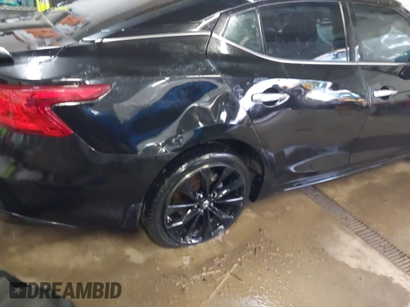 2017 Nissan Maxima S with VIN 1N4AA6AP8HC381466, listed as a IAAI auction lot 41552326 with 137,161 mi miles and . Bid and sale history available at DreamBid. Image 14.
