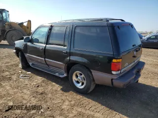 1997 Mercury Mountaineer with VIN 4M2DU55P5VUJ62435, listed as a Copart auction lot 60163465 with 105,646 mi miles and Salvage title. Bid and sale history available at DreamBid. Image 2.
