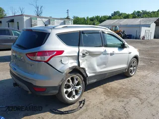 2016 Ford Escape Titanium with VIN 1FMCU9J97GUB91966, listed as a IAAI auction lot 42378829 with 121,218 mi miles and . Bid and sale history available at DreamBid. Image 4.