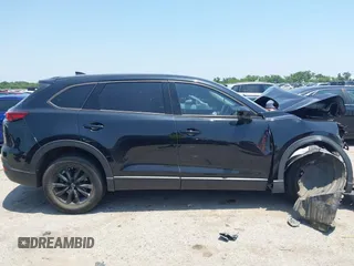 2021 Mazda CX-9 Touring with VIN JM3TCBCY8M0514905, listed as a IAAI auction lot 42385627 with 72,610 mi miles and . Bid and sale history available at DreamBid. Image 13.