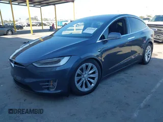 2018 Tesla Model X 75D with VIN 5YJXCDE28JF142509, listed as a IAAI auction lot 41993444 with 100,244 mi miles and . Bid and sale history available at carsss.com. Image 17.