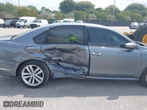 2019 Volkswagen Passat 2.0T Wolfsburg Edition with VIN 1VWLA7A35KC011084, listed as a IAAI auction lot 40385111 with 81,119 mi miles. Bid and sale history available at carsss.com. Image 6.