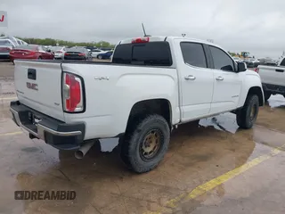 2018 GMC Canyon 4WD SLT with VIN 1GTP6DE18J1111056, listed as a IAAI auction lot 41903405 with 99,280 mi miles. Bid and sale history available at carsss.com. Image 4.
