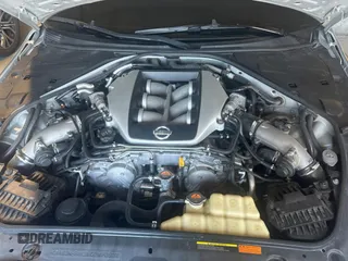 2009 Nissan GT-R Premium z VIN JN1AR54F89M252013, wystawiony jako Copart lot #82469654 z przebiegiem 66 337 mil mil oraz Szkoda całkowita • Salvage title. Historia ofert i sprzedaży dostępna na DreamBid. Obrazek 7.