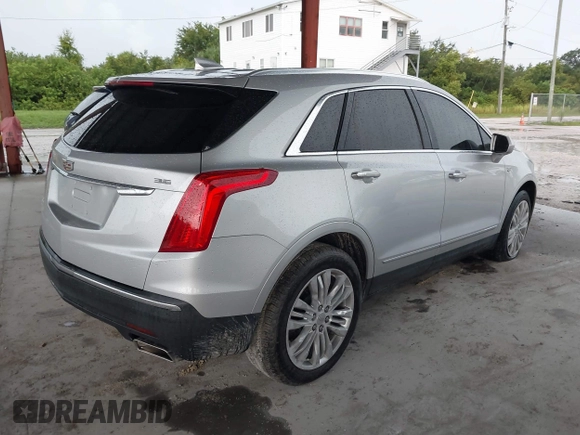 2018 Cadillac XT5 Premium Luxury FWD z VIN 1GYKNERS7JZ214504, wystawiony jako IAAI lot #40067507 z przebiegiem Nie podano mil oraz . Historia ofert i sprzedaży dostępna na DreamBid. Obrazek 4.