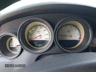 2010 Dodge Charger SXT with VIN 2B3CA3CV9AH311637, listed as a IAAI auction lot 42079657 with 187,683 mi miles. Bid and sale history available at carsss.com. Image 7.