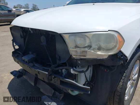 2013 Dodge Durango SXT with VIN 1C4RDHAG9DC678353, listed as a IAAI auction lot 42553988 with 174,042 mi miles and . Bid and sale history available at DreamBid. Image 6.