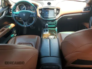2014 Maserati Ghibli z VIN ZAM57XSA7E1126742, wystawiony jako Copart lot #57495135 z przebiegiem 50 077 mil mil oraz Szkoda całkowita • Salvage title. Historia ofert i sprzedaży dostępna na DreamBid. Obrazek 8.