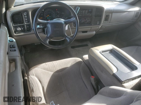 2000 GMC New Sierra 1500 SLE with VIN 2GTEK19T7Y1310097, listed as a Copart auction lot 84557764 with 257,060 mi miles and Salvage Title. Bid and sale history available at carsss.com. Image 8.