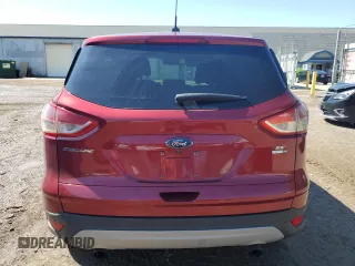 2016 Ford Escape SE z VIN 1FMCU9GX1GUA52213, wystawiony jako Copart lot #57137545 z przebiegiem 142 646 mil mil oraz Czysty tytuł • Clean title. Historia ofert i sprzedaży dostępna na DreamBid. Obrazek 6.